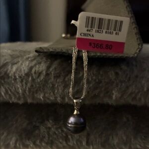 Elegant three strand Silver necklace and Black Pearl pendant